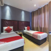 Отель OYO 763 Tazara Hotel, фото 6