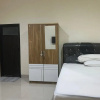 Отель OYO 93877 Atifah Homes, фото 3