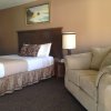 Отель Rest Assured Inns & Suites, фото 7