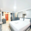 Отель Homey And Warm Studio Apartment At Mansyur Residence, фото 6