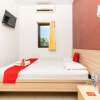 Отель RedDoorz Plus @ Jalan Pumorow Manado, фото 14