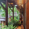 Отель Pingle Ancient Town Lijiang Hostel, фото 10