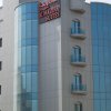 Отель Al Madina Suites Doha в Дохе