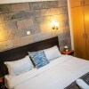 Отель Stay.Plus Wood Avenue Apartment Kilimani, фото 2