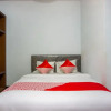 Отель Wisma Permata by OYO Rooms, фото 16