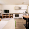 Отель Familiensuite mit Bergblick H Ggen, фото 3