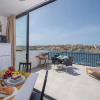 Отель Harbour Lights Seafront Penthouse by Getaways Malta, фото 17
