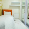 Отель Comfort 2BR with Pool View Green Pramuka City Apartment, фото 8