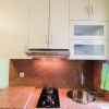 Отель Cozy 2BR Bassura City Apartment, фото 2