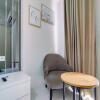 Отель Fancy And Nice 1Br With Extra Room At Amartha View Apartment, фото 5