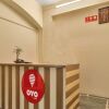 Отель OYO 12301 RG Suites, фото 10