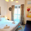 Отель Cozy Apartment in Acropolis With Roof Garden, фото 4