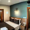 Отель Rest Inn Hotel, фото 1