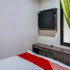 Отель OYO 90940 Guesthouse Colombus G12, фото 4