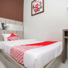 Отель OYO 747 Cipunegara Residence, фото 17