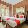 Отель OYO 3896 Villa Pesona Wisata Puncak, фото 11