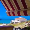 Отель 4 bedrooms appartement with sea view enclosed garden and wifi at Lido Rossello, фото 1