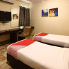 Отель OYO 18592 M Hotel, фото 6