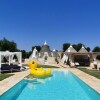 Отель Antico trullo ristrutturato con piscina e giardino, фото 23