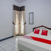 Отель OYO 90543 An-nur Guest House Syariah, фото 25