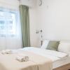 Отель Sunlit Urban Escape with Balcony by Sea N Rent, фото 6