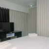 Отель Homey and Relaxing 2BR The Wave Apartment, фото 1