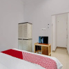 Отель OYO 92211 Timur Raya Homestay Syariah, фото 25