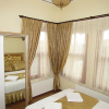 Отель Blue Eye Suites, фото 4