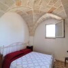 Отель Antico trullo ristrutturato con piscina e giardino, фото 4