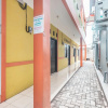 Отель OYO Living 1756 Amira Guest House, фото 18