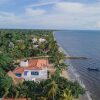 Отель Villa El Francés 4BD WPool & Beach Front в Толу