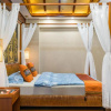 Отель Xishuangbanna Shanlin Guest House, фото 1