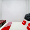 Отель OYO 91224 Brayan Guest House, фото 7