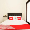 Отель OYO Living 1743 Anie Residence, фото 7