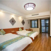 Отель Zhangjiajie Tule Guesthouse Inn, фото 3