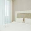 Отель Comfy and Minimalist Studio Apartment at Tree Park BSD, фото 10