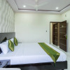 Отель Treebo Greenwood Premier Suites, Old Airport Road, фото 4