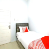 Отель Guesthouse Pagi Sore Syariah by OYO Rooms, фото 2