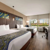 Отель La Quinta Inn & Suites By Wyndham Orlando - Idrive Theme Parks, фото 3