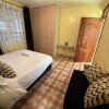 Отель Lux Suites TRM 1 Bedroom Apartments в Найроби
