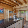 Отель Grizzlies Den 4 Bedroom Cabin by RedAwning, фото 9