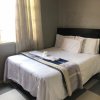 Отель Devine lodge Yeovile в Йоханнесбурге