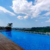 Отель Fancy And Nice 1Br With Extra Room At Amartha View Apartment, фото 8
