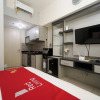 Отель RedLiving Apartemen Springlake Summarecon - Happy Rooms with Netflix, фото 14