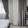Отель Cozy and Nice Studio at Bintaro Icon Apartment By Travelio, фото 1