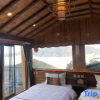 Отель Muli Xuhuiju Inn, фото 3