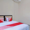Отель OYO 92928 Lavina Guesthouse, фото 15
