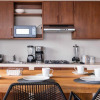 Отель Three Bedroom Condo Steps From the Beach, фото 5
