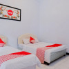 Отель OYO 421 Alianda Guest House Syariah, фото 6