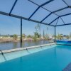 Отель Canalfront Cape Coral Home w/ BBQ - Pets Welcome!, фото 14